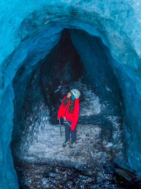 Guests exploring inside Blue Ice Cave in Vatnajökull, Iceland.