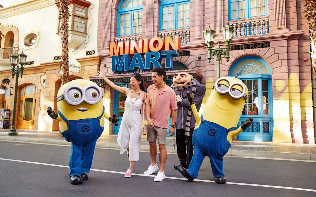 Family enjoying time with Minions at Universal Studios Singapore.