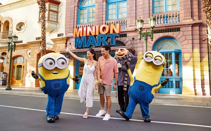Family enjoying time with Minions at Universal Studios Singapore.