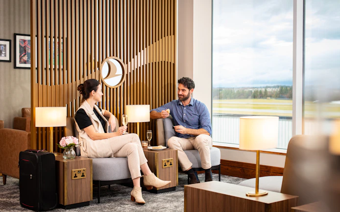 Guests relaxing at Turkish Airlines Lounge, Edinburgh Airport.