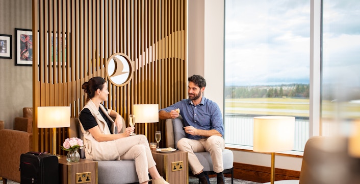 Guests relaxing at Turkish Airlines Lounge, Edinburgh Airport.