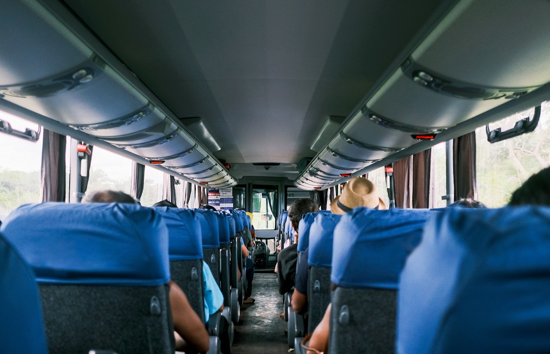 GT coach with a guided tour