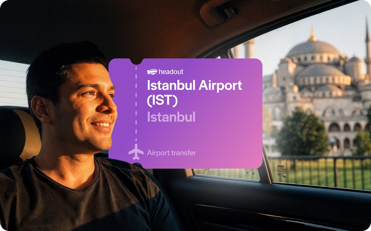 Man in car with Blue Mosque view, Istanbul airport transfer.