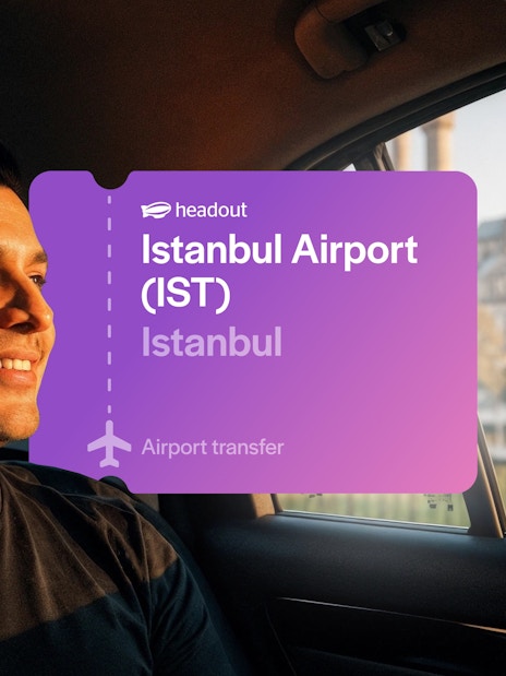 Man in car with Blue Mosque view, Istanbul airport transfer.