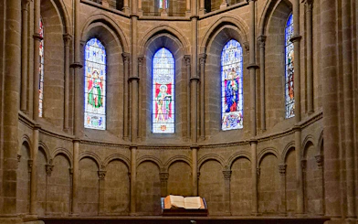 Stained glass windows inside St. Pierre Cathedral, Geneva, on a guided tour.