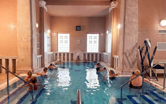 Visitors relaxing in the Lukács Thermal Bath in Budapest.