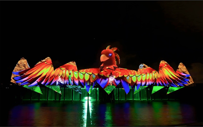 Wings of Time night show with colorful lights at Sentosa Island.