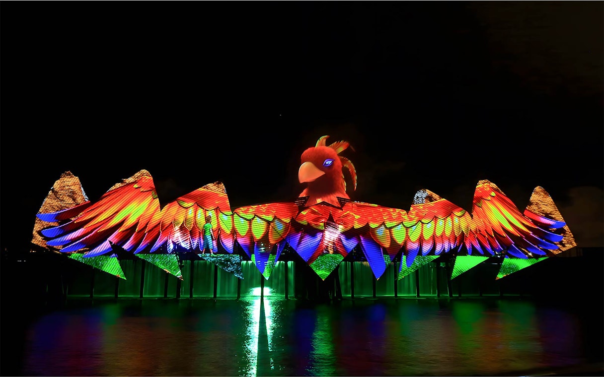Wings of Time night show with colorful lights at Sentosa Island.