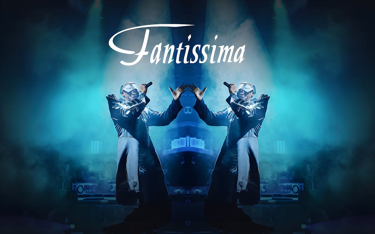 Performer on stage at Fantissima Dinner Show with dramatic lighting.