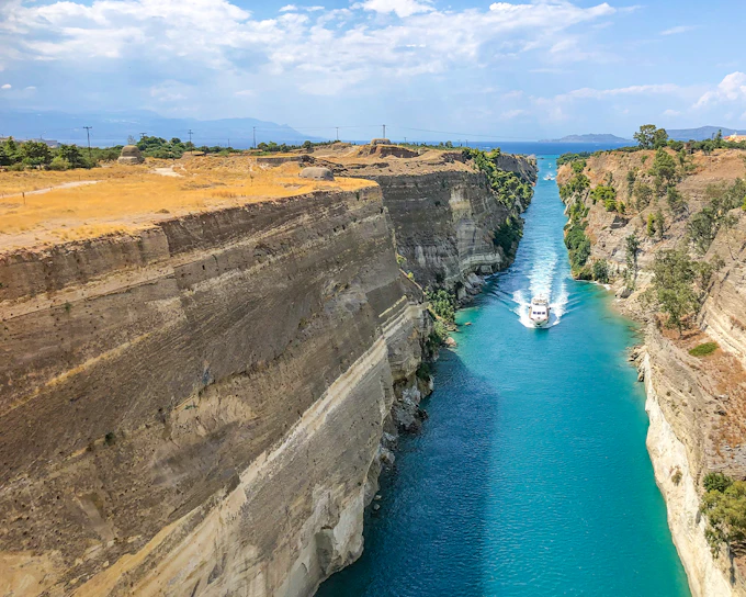 From Athens: Ancient Corinth & Corinth Canal Day Trip with VR & Audio Guide