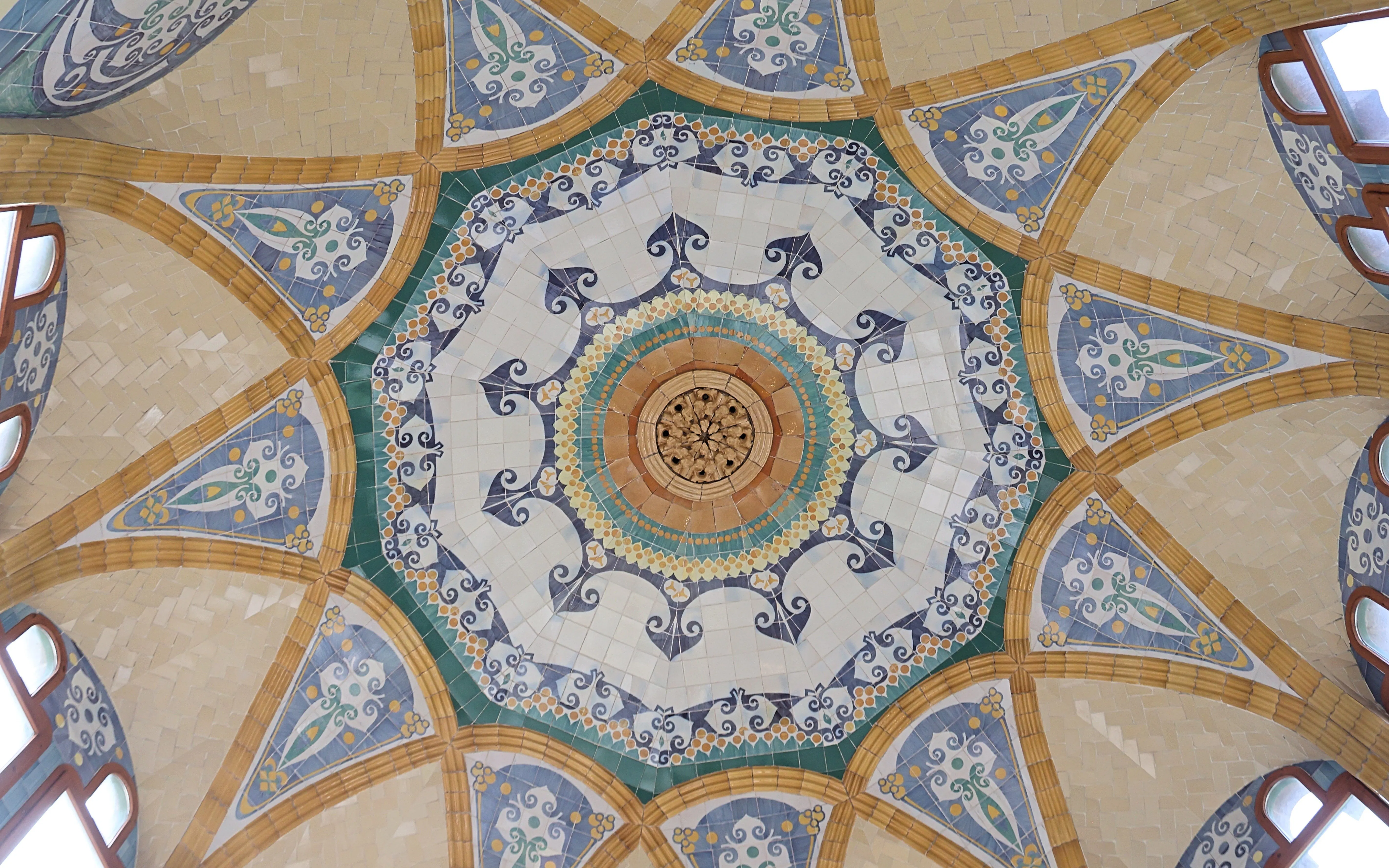 Mosaic ceiling in Hospital Sant Pau Complex, Barcelona, featuring intricate patterns and colors.