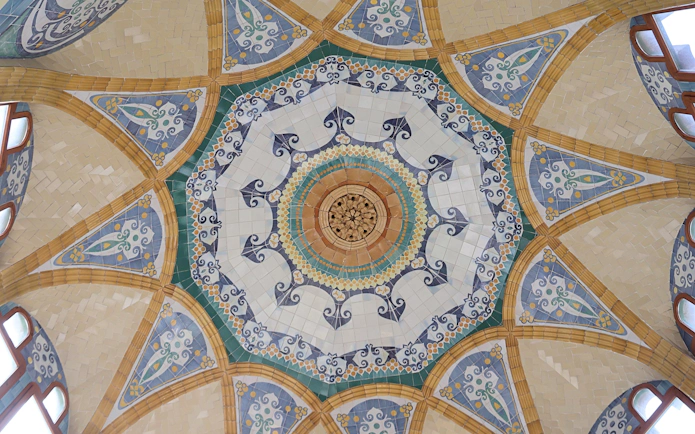 Mosaic ceiling in Hospital Sant Pau Complex, Barcelona, featuring intricate patterns and colors.