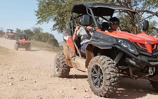 Buggy driving on a dirt trail during a 2-hour off-road tour from Albufeira.