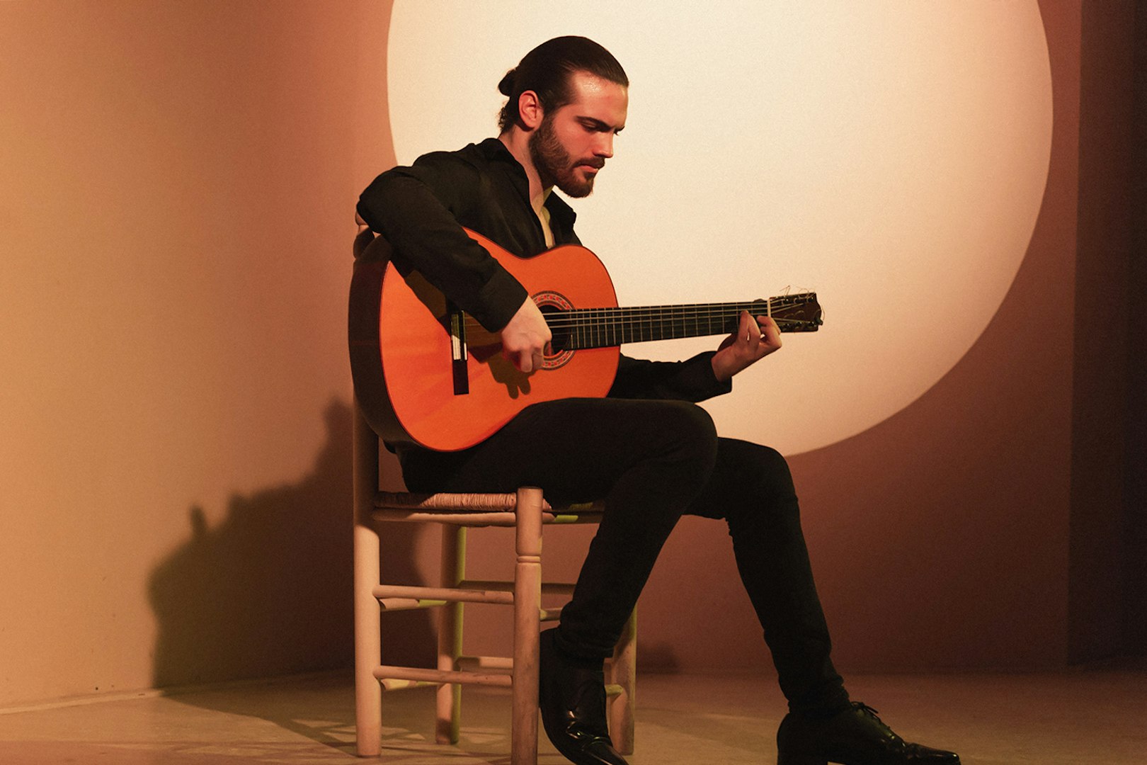 Guitarist performing at a flamenco show in Madrid.