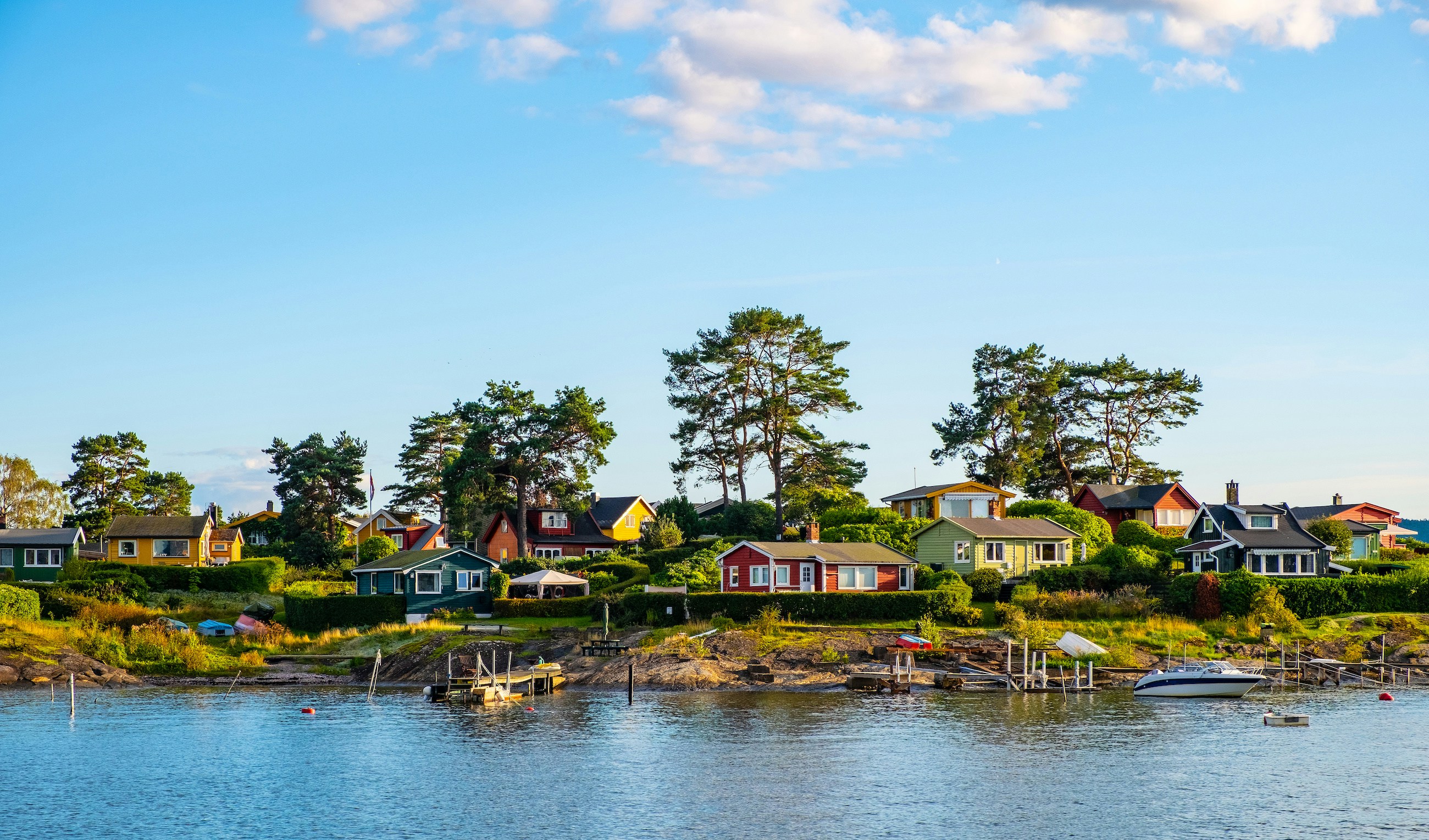 Oslo Fjord with sailboats and scenic coastline in Norway.