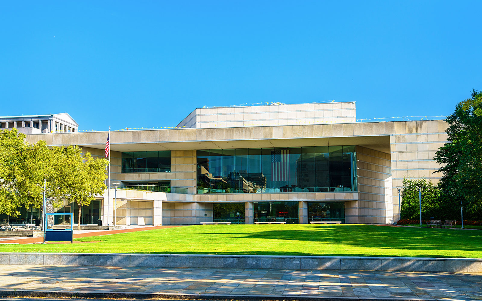 National Constitution Center building with American flag in Philadelphia.