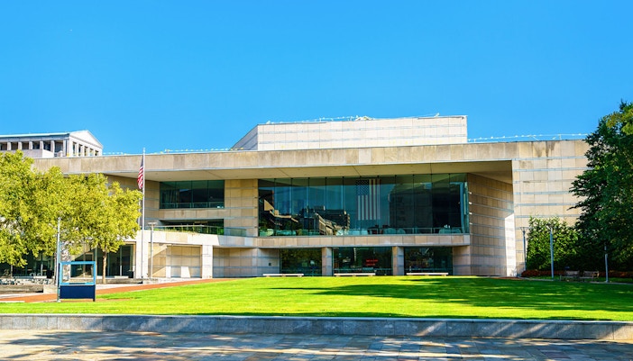 National Constitution Center building with American flag in Philadelphia.