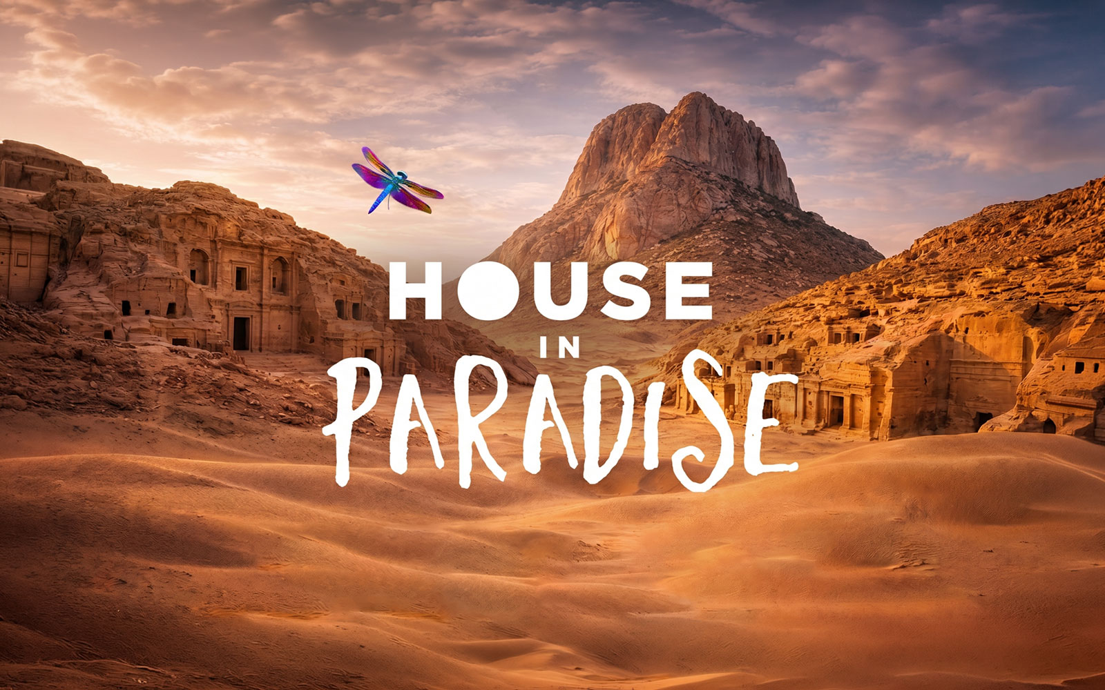 Ancient rock-cut buildings in a desert landscape, House in Paradise, O Ibiza.