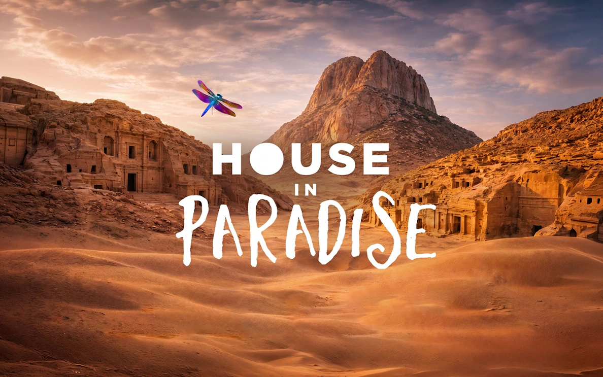 Ancient rock-cut buildings in a desert landscape, House in Paradise, O Ibiza.