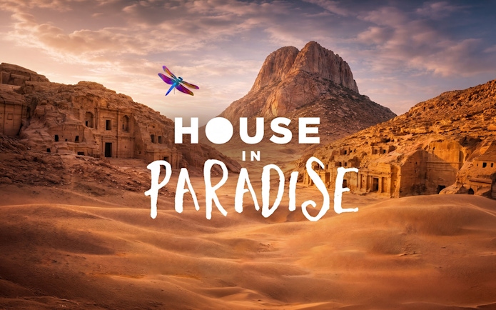 Ancient rock-cut buildings in a desert landscape, House in Paradise, O Ibiza.