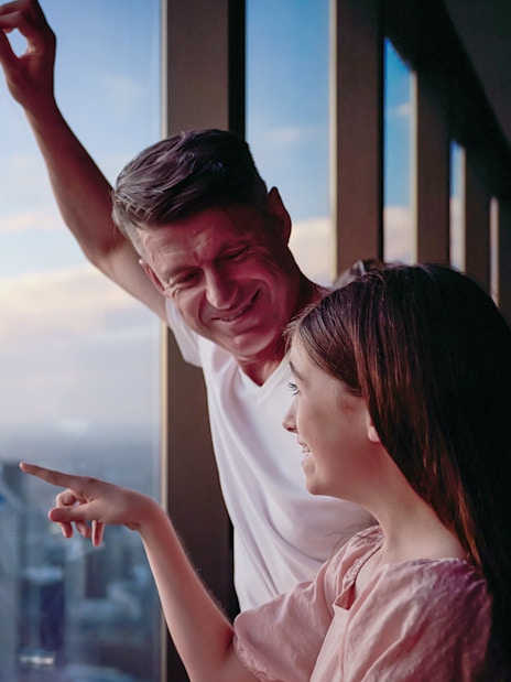 Visitors enjoying the view from Melbourne Skydeck during the Edge Experience.