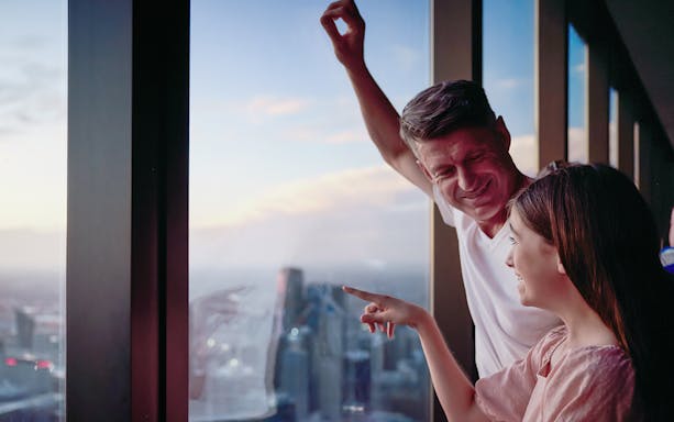 Visitors enjoying the view from Melbourne Skydeck during the Edge Experience.