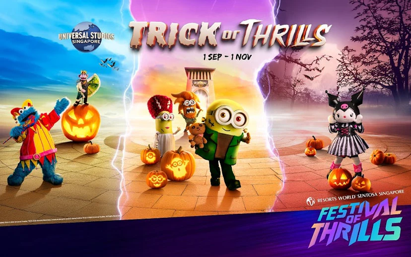 Universal Studios Singapore Trick or Thrills event with costumed characters and pumpkins.