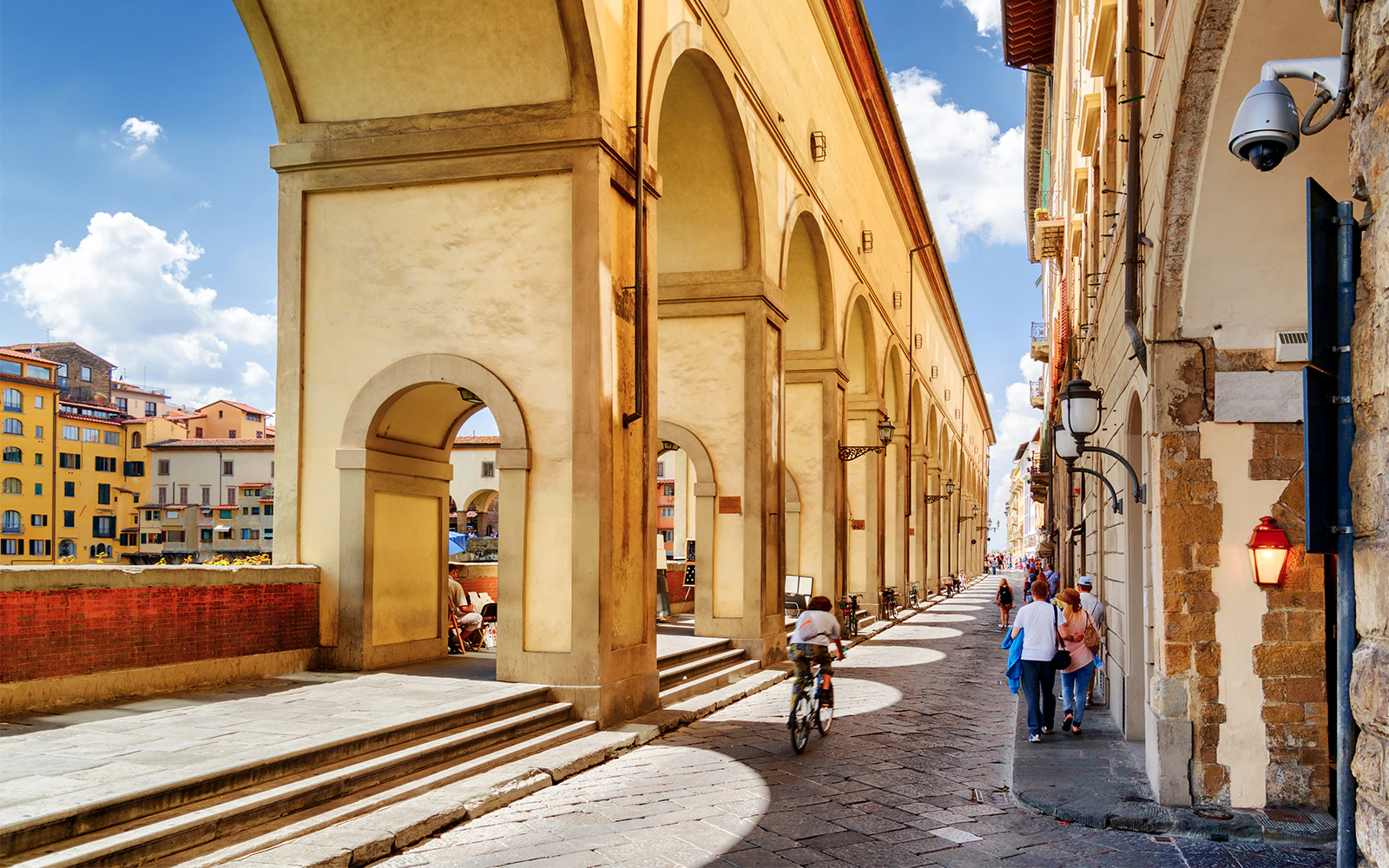 Vasari Corridor arches along the street near Uffizi Gallery, Florence.