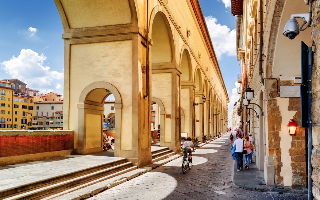 Vasari Corridor arches along the street near Uffizi Gallery, Florence.