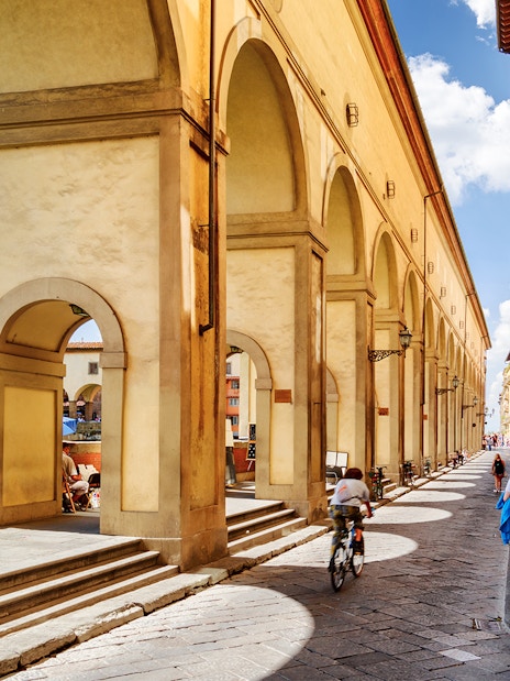 Vasari Corridor arches along the street near Uffizi Gallery, Florence.