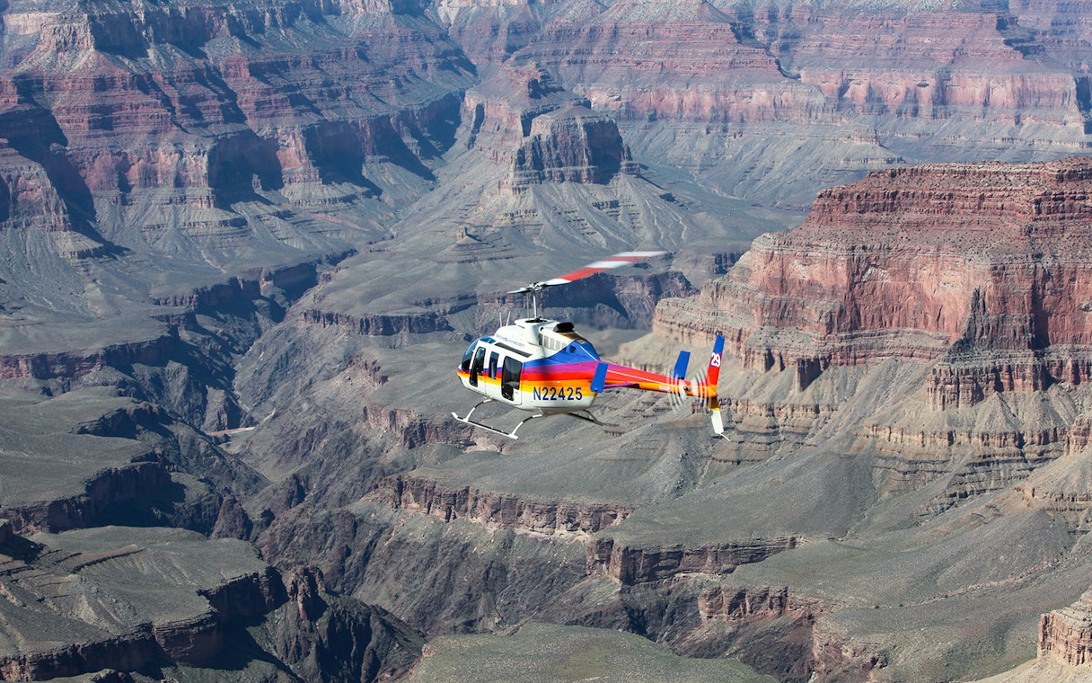 Helicopter flying over the North Grand Canyon.