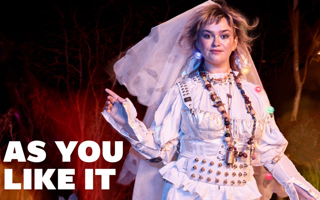 Performer in costume for "As You Like It" at West End theater.