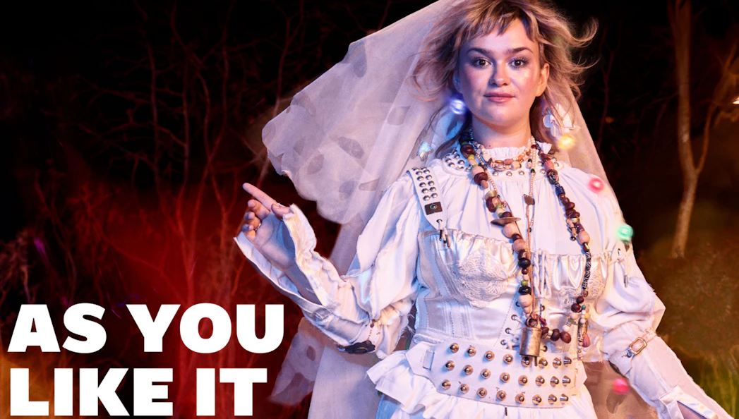 Performer in costume for "As You Like It" at West End theater.