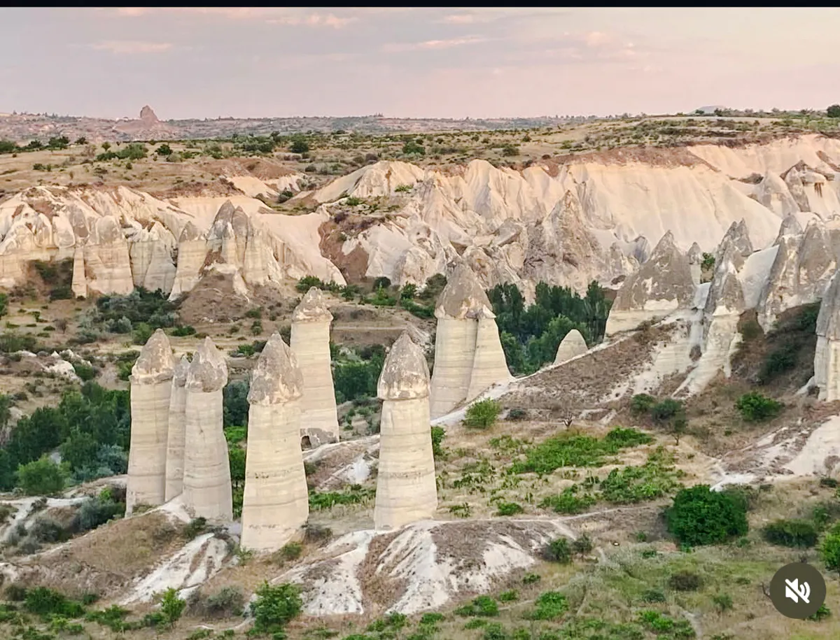 Fairy chimneys in Cappadocia landscape during private tour with English and Japanese guide.