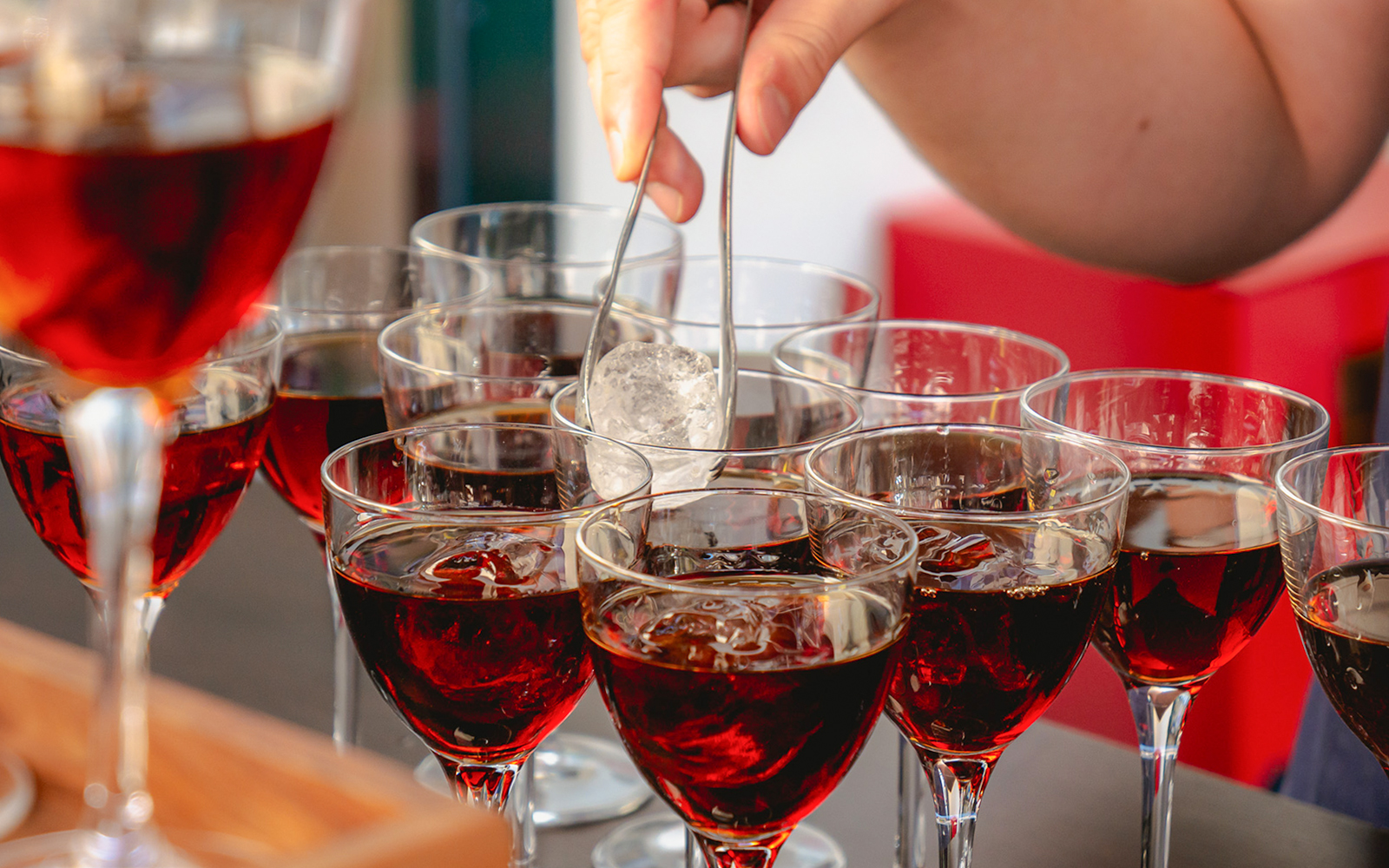 Ibiza nightlife scene with people enjoying a guided bar crawl through vibrant local bars.