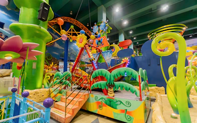 Colorful ride at Berjaya Times Square Theme Park with vibrant decorations and playful structures.