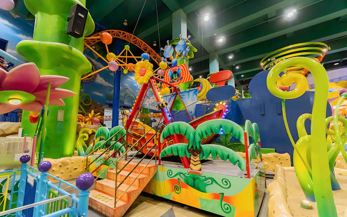Colorful ride at Berjaya Times Square Theme Park with vibrant decorations and playful structures.