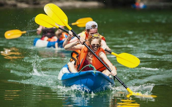 Kayaking in Lan Ha Bay on a 5-star cruise, exploring Dark & Bright Cave.