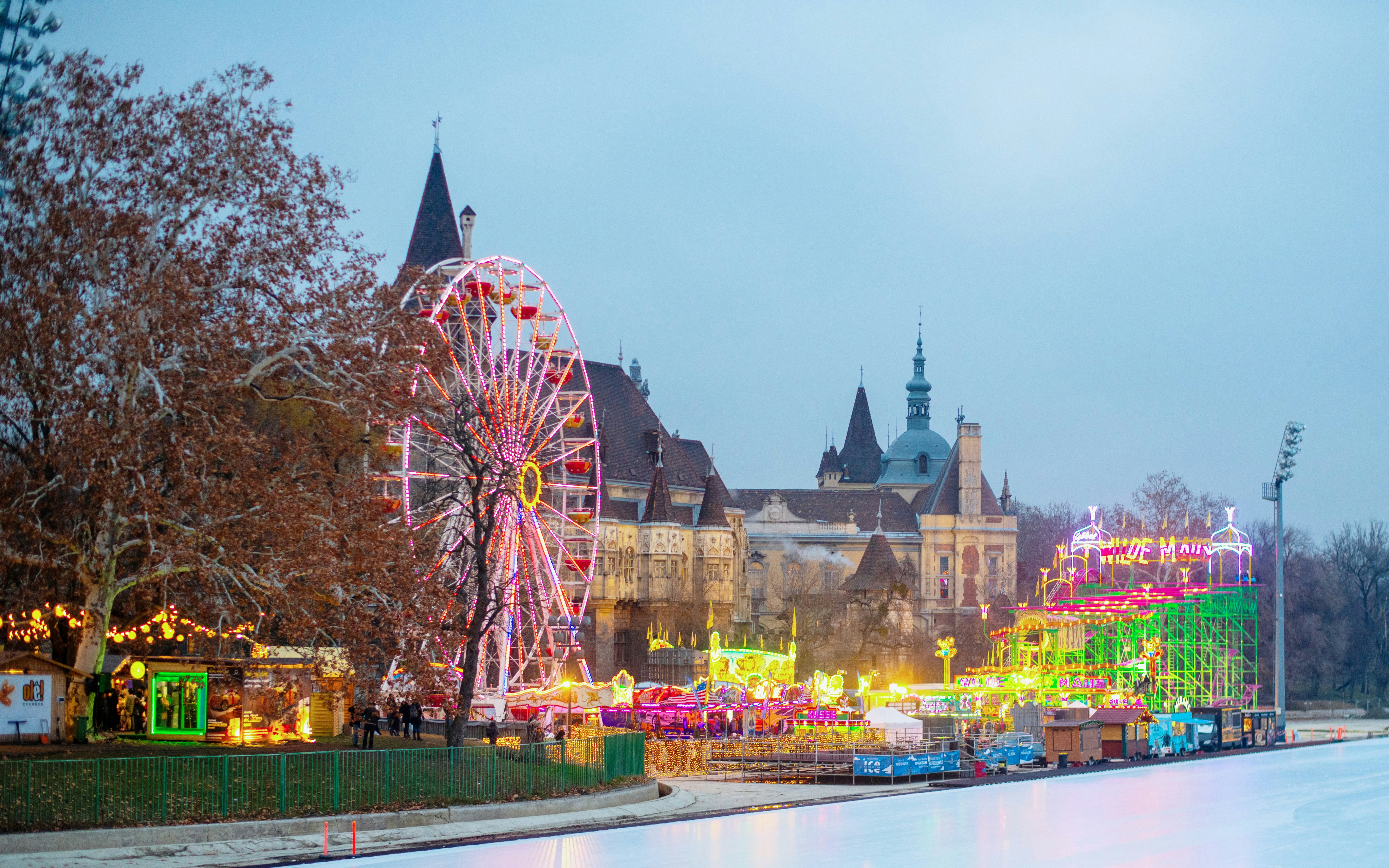 Ferris wheel and Christmas market at Vajdahunyad Castle, Budapest, Hungary.