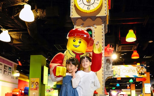 Family with LEGO figure at LEGOLAND Discovery Center, Osaka.