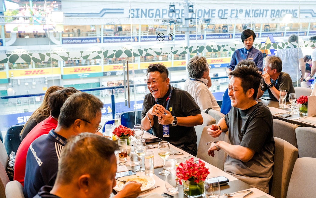 Guests enjoying hospitality at Sky Suite during Singapore F1 Night Race.