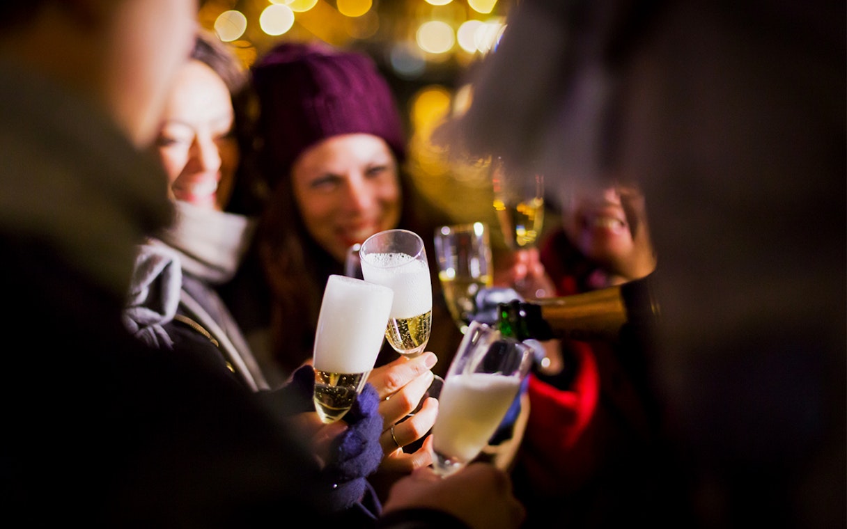 Guests toasting with champagne on the German Guided Light Festival Cruise.