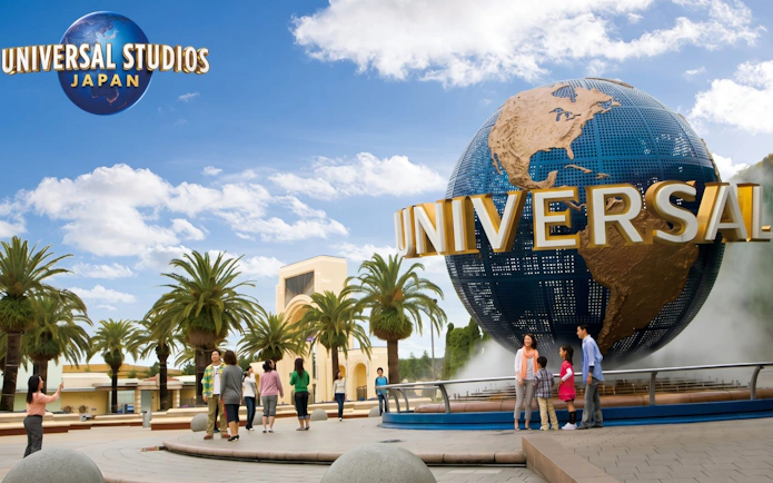 Universal Studios Japan entrance with globe and festive decorations for NO LIMIT! Countdown 2024 Party Pass event.