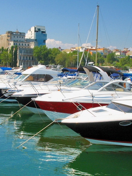 Boats docked in Constanta harbor for a Black Sea trip.