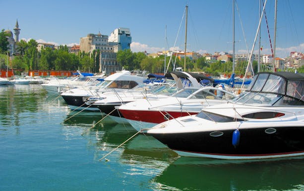 Boats docked in Constanta harbor for a Black Sea trip.
