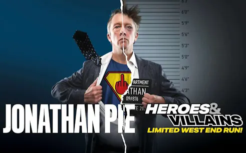 Jonathan Pie in split superhero and mugshot attire for Heroes and Villains show.