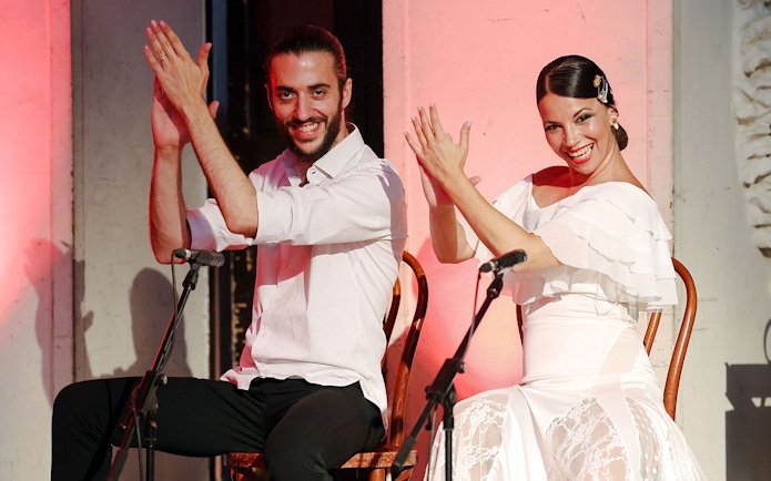 Flamenco performers clapping at Palau de la Música, Barcelona.