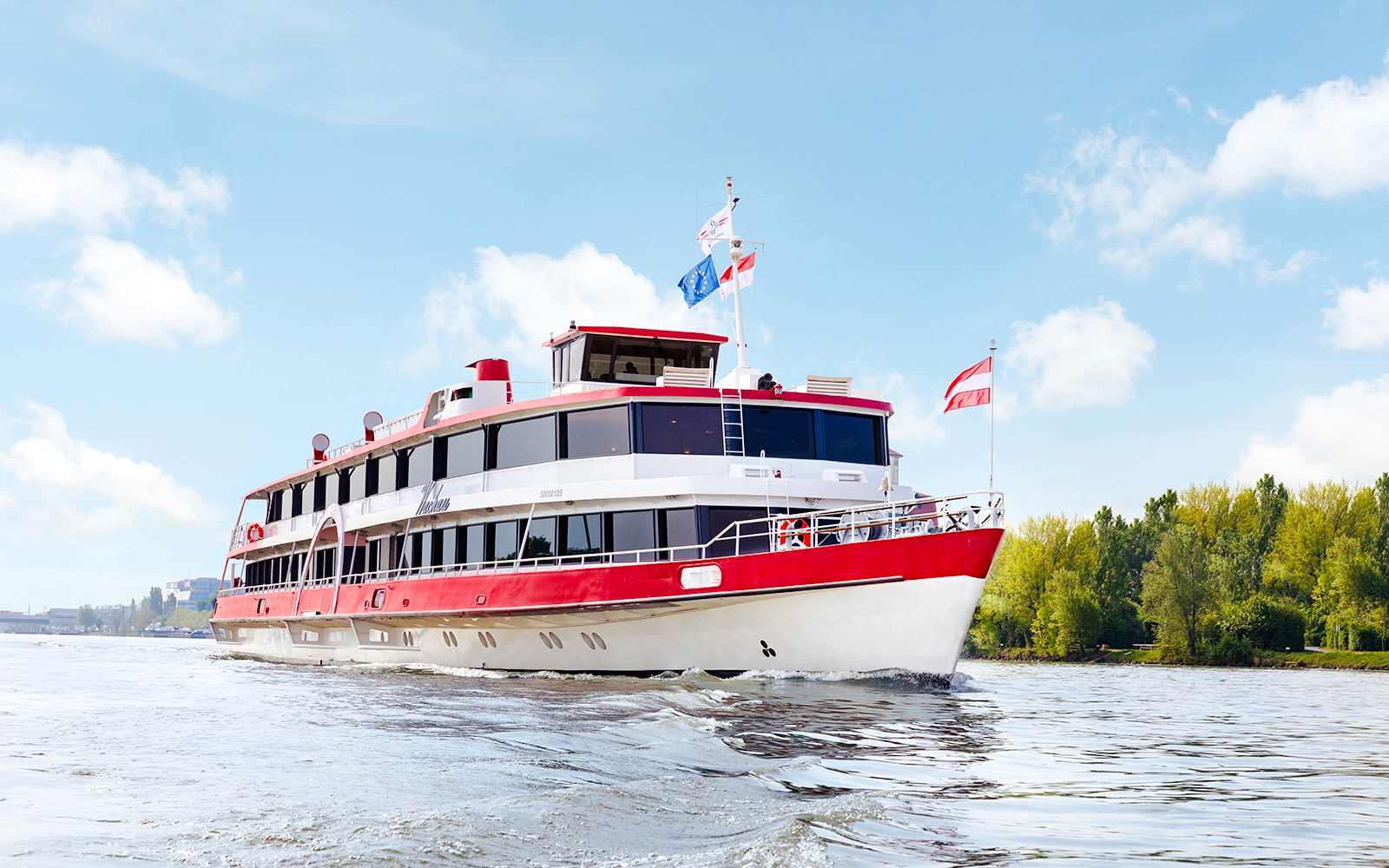 Cruise ship on the Danube River in Vienna, Austria.
