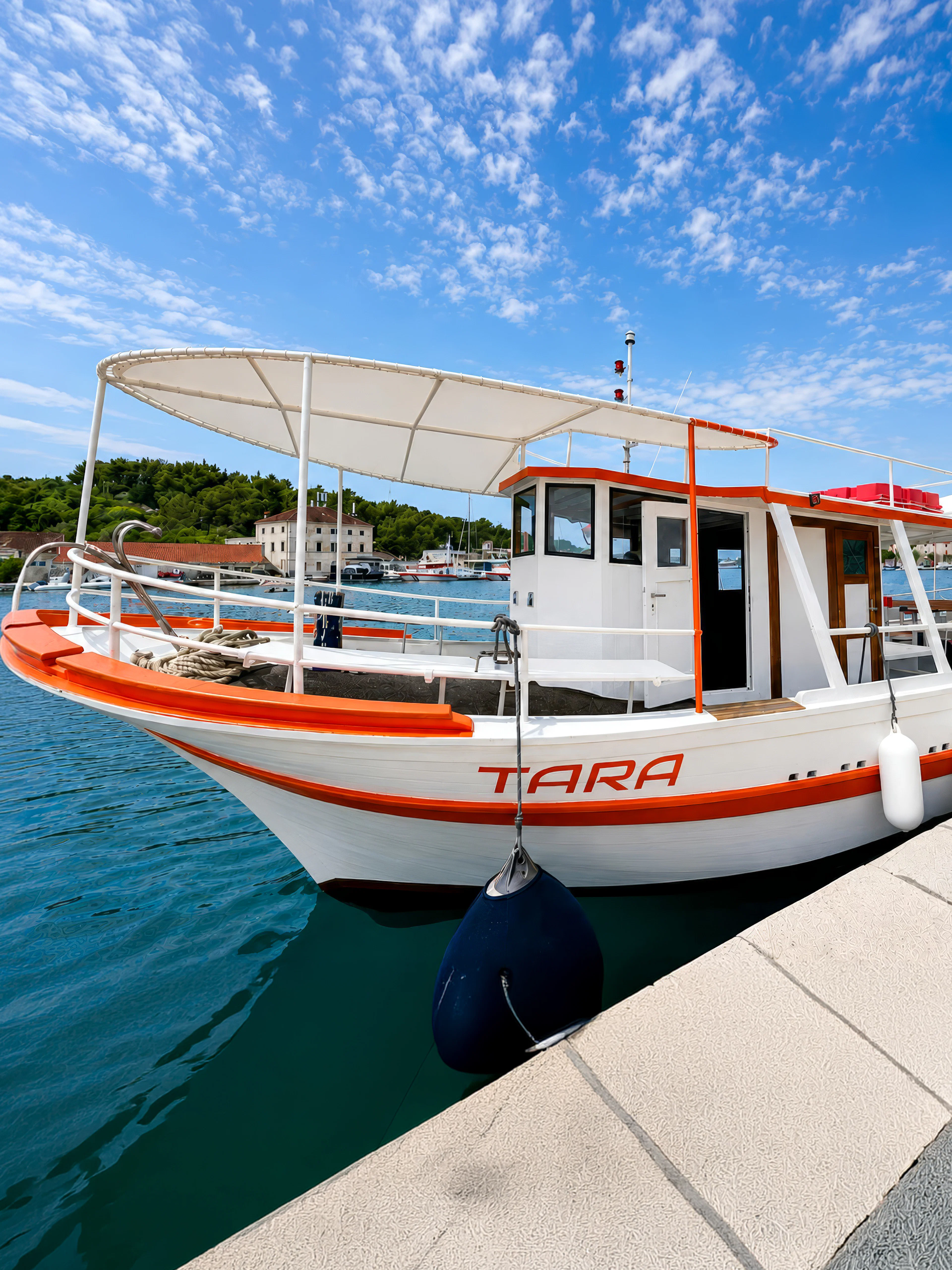 Boat docked in Trogir for Blue Lagoon and Maslinica tour.