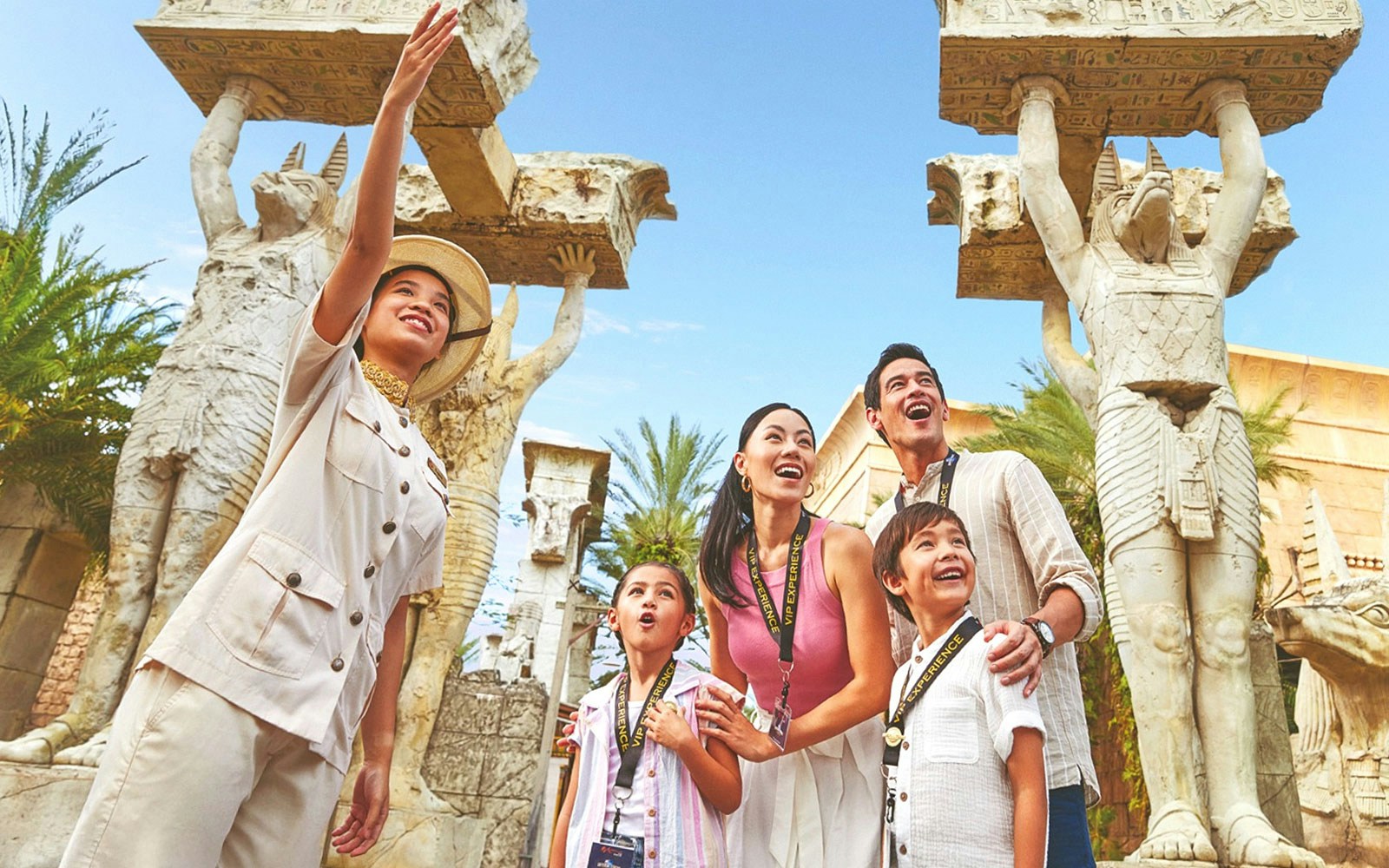 Family enjoying Universal Studios Singapore VIP Experience with ancient Egyptian statues.